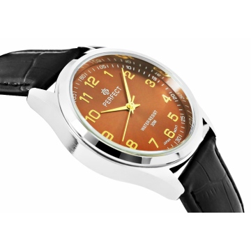 Zegarek męski marki Perfect na czarnym skórzanym pasku z czarną nitką. Złote wskazówki i indeksy na brązowej, metalicznej tarczy z cyframi arabskimi. Srebrna koperta zegarka w rozmiarze 38 mm.