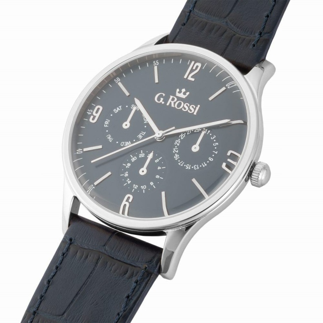 Zegarek męski G.Rossi na granatowym skórzanym pasku. Srebrne wskazówki i indeksy na granatowej tarczy z cyframi arabskimi. Średnica koperty zegarka w rozmiarze 42 mm.