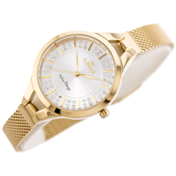 Zegarek damski G.Rossi na złotej bransolecie mesh. Złote wskazówki i indeksy na srebrnej tarczy ozdobionej cyrkoniami. Koperta zegarka w kolorze złotym, o średnicy 33 mm.