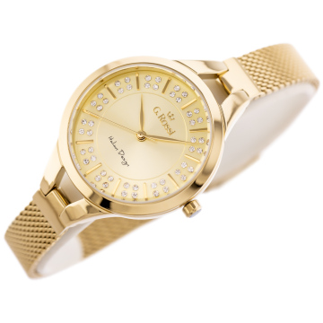 Zegarek damski G.Rossi na złotej bransolecie mesh. Złote wskazówki i indeksy na złotej tarczy ozdobionej cyrkoniami. Koperta zegarka w kolorze złotym, o średnicy 33 mm.